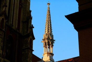 gothic architecture spire city scape landmark urban building foreground frame work Europe culture aesthetic