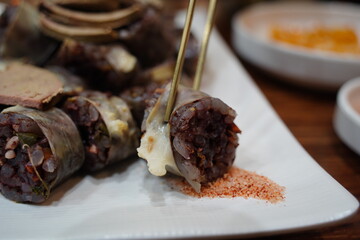 Delicious Korean blood sausage (Sundae) with liver slices, a popular traditional street food