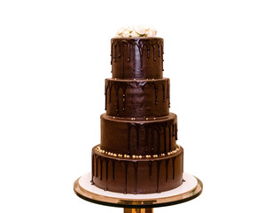 Mouth-watering 3-tier dark chocolate dripping tall cake on an isolated background  