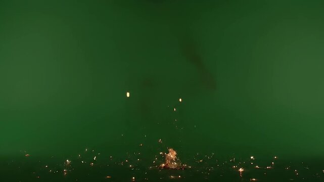 Ground Level Explosion of Welding Sparks bursting on Green Screen for Industrial or Combat VFX - 3D Rendering