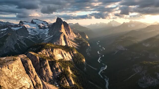 Exploring Majestic Mountain Range at Sunrise over Rugged Peaks and winding river