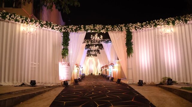 Elegant Wedding Venue Decor with Floral Arrangements and Ambient Lighting