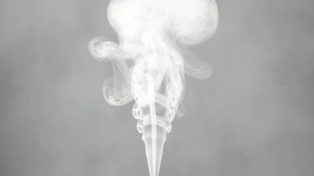 Smoke swirling in a cone shape against a grey background  