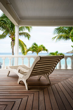 Lounge chair on an empty deck in the tropical Caribbean