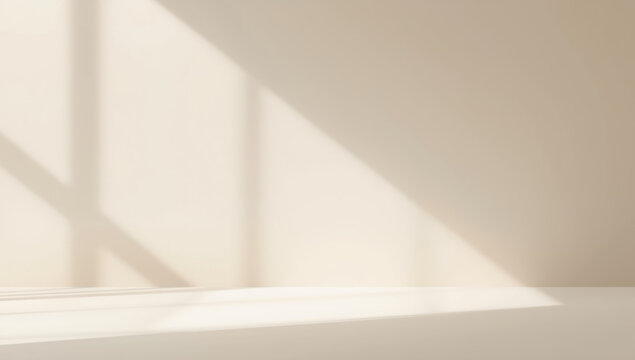 Soft beige interior with window light casting geometric shadows, calm minimal scene