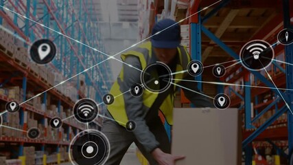 Animation of network of connections with icons over caucasian male worker in warehouse - Powered by Adobe