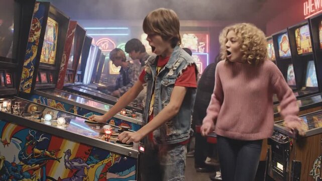 Nostalgic 80s Teenagers Excitedly Playing Retro Pinball Machines in Arcade