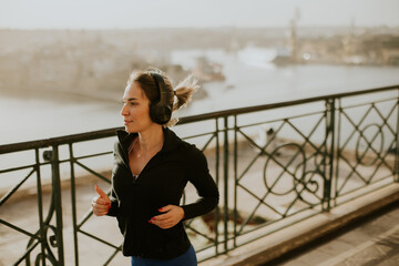 Morning jog along the scenic waterfront with a refreshing breeze