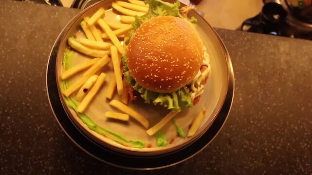 Serving Zinger Burger and French Fries &ndash; Delicious Meal Preparation