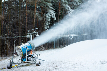 Snowmaking Machine Producing Artificial Snow In Forest