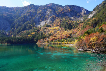 The breathtaking scenery of the crystal-clear, turquoise lake at Five Flowers Lake, Jiuzhaigou National Park in Sichuan Province, China