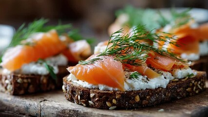 Closeup on gourmet salmon appetizers with rustic bread and fresh dill garnish