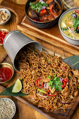 pad thai chicken stir fry noodles in modern restaurant in thailand