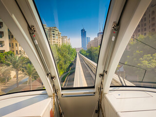 Dubai Palm Jumeirah view from Monorail. Panoramic view of artificial island from a train