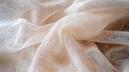 A crumpled piece of white fabric with a soft, textured appearance.
