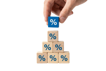 Hand Placing Blue Percentage Symbol Block on Top of Wooden Block Pyramid on Transparent Background
