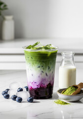 vertical iced blueberry matcha latte with copy space for social media stories