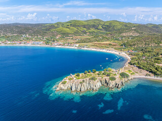 Aerial view of Toroni beach and Likithos Castle ruins in Halkidiki, Greece.