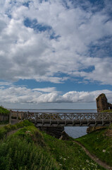 Scotland, Uk: access walkway at Castle Sinclair Girnigoe, complex of spectacular ruins on the coast of Caithness of two joined castles seat of the Clan Sinclair, Lords of Orkney and Earls of Caithness