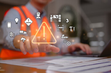 Engineer wearing safety vest pointing at caution triangle sign and work safety icons. Concept of quality assurance, certification, inspection, compliance, standards, and project approval.