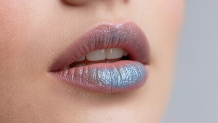 Shimmering artistic lip makeup.