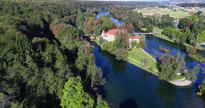 Otočec Castle surrounded by river and park, Slovenia.
