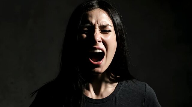 Woman Shouting in Darkness.