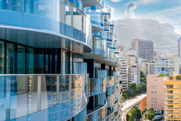 cityscape sunset view of a Monte Carlo city in Monako with high buildings, tall skyscrapers and...