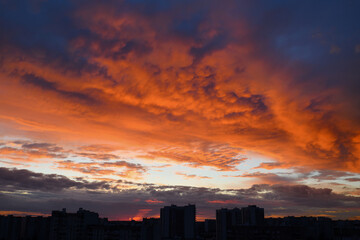 Beautiful panoramic sunset with city on the horizon