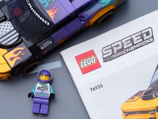 Obraz premium Tambov, Russian Federation - January 04, 2026 Lego Speed Champions kit with Nascar Next Gen Chevrolet Camaro car, driver minifigure and it instruction book