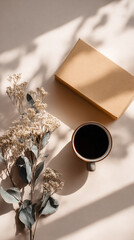 Minimal caf&eacute; scene: gift box and coffee, airy vertical marketing shot.