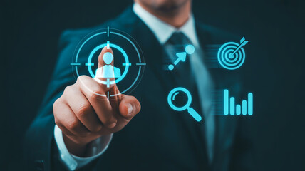 Businessman's finger touching digital target icon with search and analytics symbols focus goal