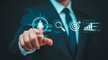 Hand in suit pointing to digital target icon with user, search, and data icons business focus