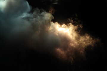 yellow-gray smoke on a black background