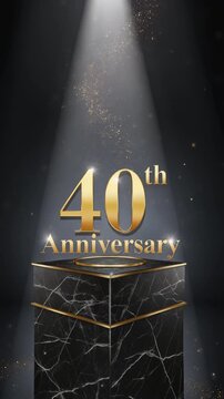 Golden 40th Anniversary text illuminated by a spotlight on a marble pedestal with gold accents.