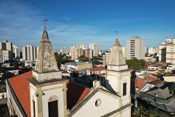 Obraz premium Aerial view of Nossa Senhora do Rosario Church in Taubate, Brazil, 18th century historic colonial church under sunny blue sky