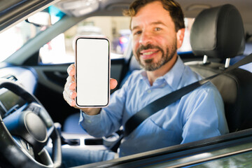 Rideshare driver showing mobile app with blank screen for online booking and transportation service