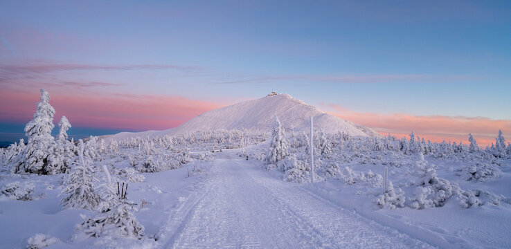 amazing winter sunset in Karkonosze mountains with Snezka peak