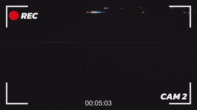 CCTV recording interface overlay with glitch effect, icons on a pure black background. surveillance camera footage, security system visuals, or digital monitoring effects. CAM 2