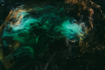 Abstract green background. Moving smoke flow, fluid liquid art.