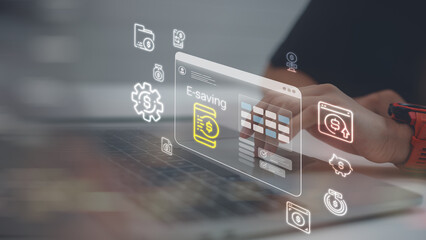 Close up of a person using a laptop for e-saving and digital banking with financial interface icons, focusing on online investment and money management in a modern workspace.
