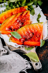 Sweet toasted watermelon with red pepper and mint