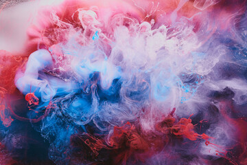 Abstract colorful smoke background. Moving flow of blue, red, white paints, fluid art