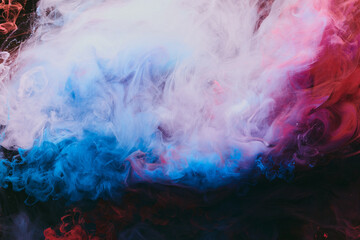 Abstract colorful smoke background. Moving flow of blue, red, white paints, fluid art