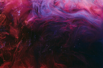 Abstract colorful smoke background. Moving flow of blue, red, white paints, fluid art