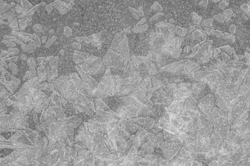 Gray background with frozen water and crystals. Top view.