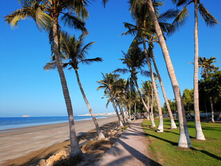 Al Qurum beach and waterfront walking area among the palm trees in Muscat, Oman