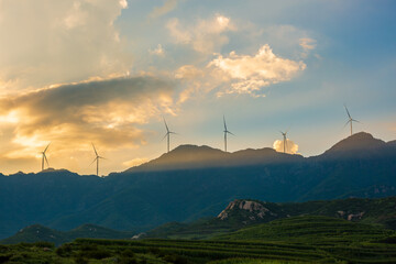 Wind turbines sunset landscape on Bailong Mountain, Lan County, Shanxi, China