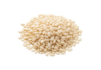 Fototapeta premium Neat pile of pale cream hulled white sesame seeds, irregular oval, on a transparent background with copy space, soft lighting. Concept of healthy spices