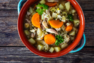 Krupnik - polish barley soup with chicken. Top view